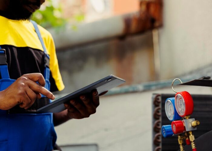 african-american-electrician-doing-leak-checks-other-necessary-repairs-prevent-major-breakdowns-licensed-serviceman-verifying-air-conditioner-writing-findings-clipboard_482257-70255